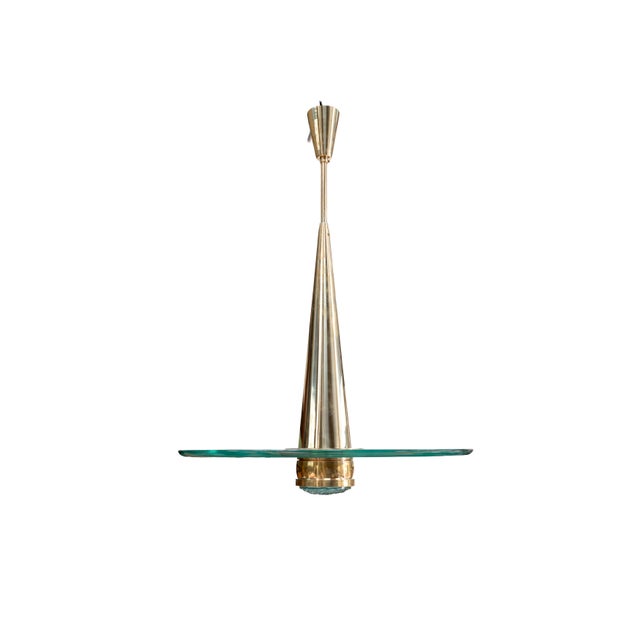 Brass and chiselled glass, thick parabola This piece is attributed to the mentioned designer/maker. It has no attribution...