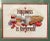 Inviting and colorful cross stitch crafted in 1984. Features the saying "Happiness is Homemade" and is embellished with...