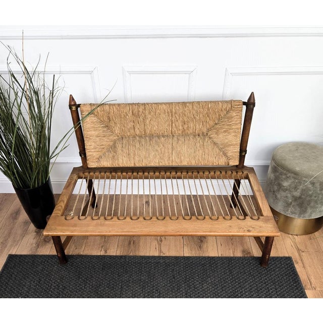 Stylish and beautiful 1960s Mid-Century Modern bench lounge sofa in wood with new seating pillow and cord or woven rope...