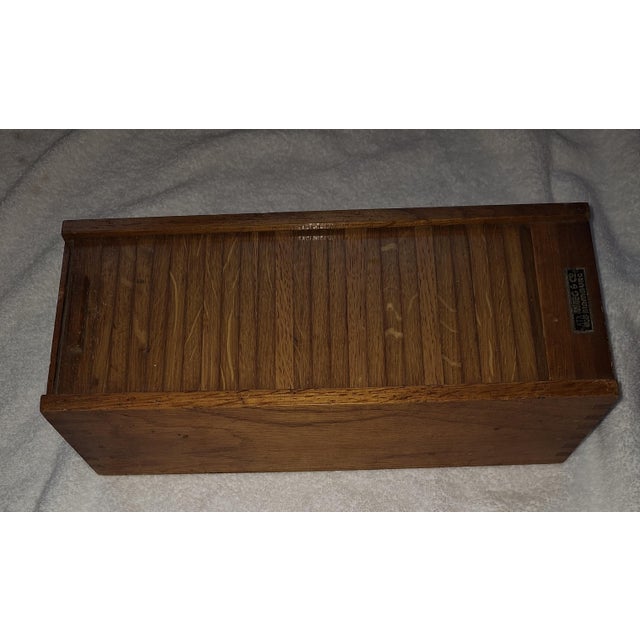 Vintage German Box in Oak Wood with Roller Shutter Closure by Wieg & Co, 1930s, in Very Good conditions. Designed 1920 to...