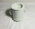 Antique porcelain mug with dual handle with strainer for coffee or tea grounds perhaps for outdoor camp usage
