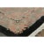 Handmade in wool, this 8x10 Antique Chinese rug, circa 1920–1929, features a graceful floral medallion enclosed by...