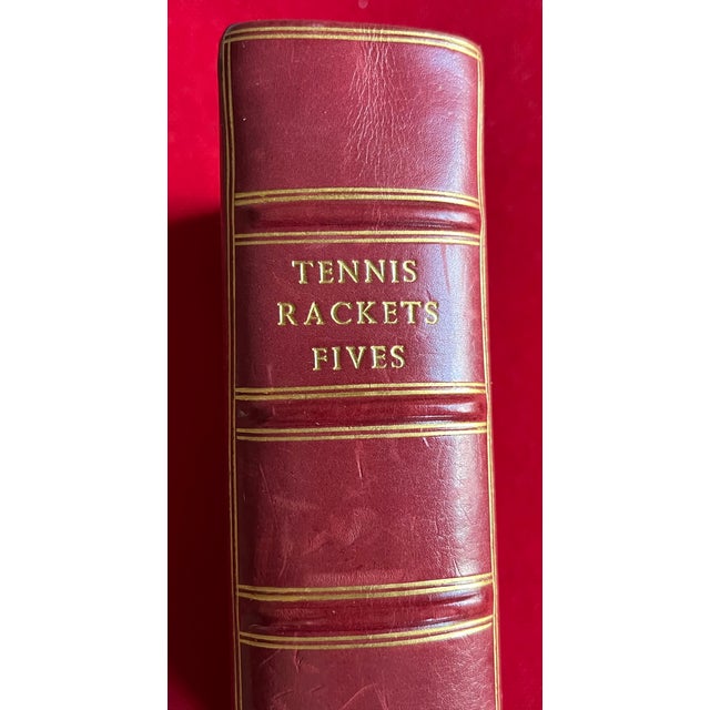 Fine red leather binding - "Tennis, Rackets, Fives" by J. M. Heathcote. Dedicated to the Prince of Wales. Published by...