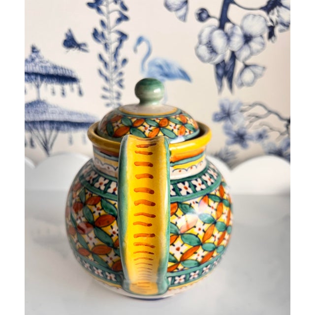 This Ponte Yecchio handcrafted teapot is a beautiful piece of pottery originating from Italy. Standing at 7 inches tall...