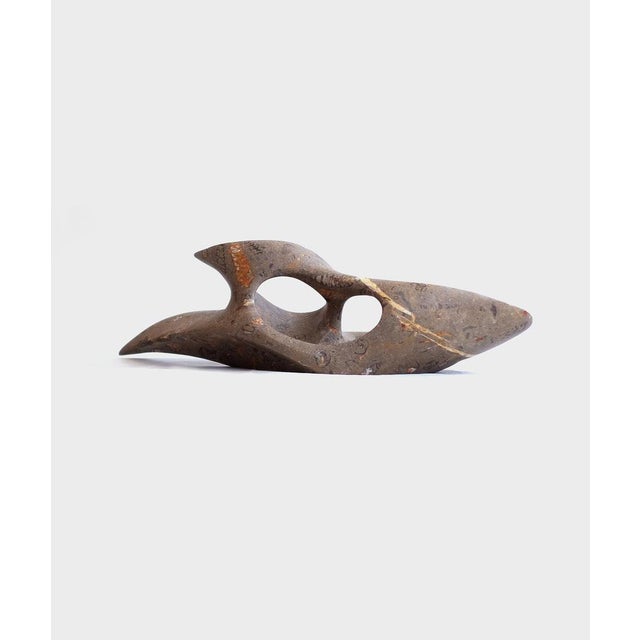 Sculpture centerpiece in jurassic fossil stone by nerinea. Dimensions: w 50 x d 15 x h 15 cm. Materials: natural stone...