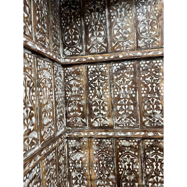 Add warmth and character to your home with this antique hand-carved corner bookshelf, a beautifully crafted piece designed...