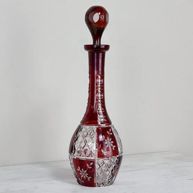 Antique Cranberry Glass Hand-Cut Crystal Decanter is an exquisite example of a master glass artist! Using the rich ruby-...
