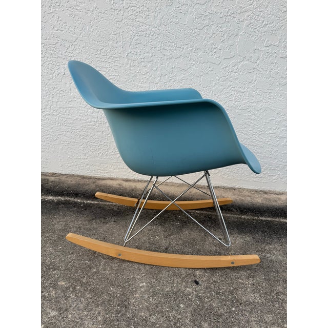 Own one of the most iconic designs in modern furniture history—the Eames Molded Plastic Rocking Chair (RAR), originally...