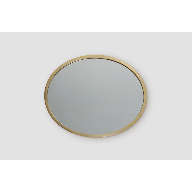 This elegant Belgian Art Deco mirror from around 1925 embodies the refined geometry and subtle glamour that defined the...