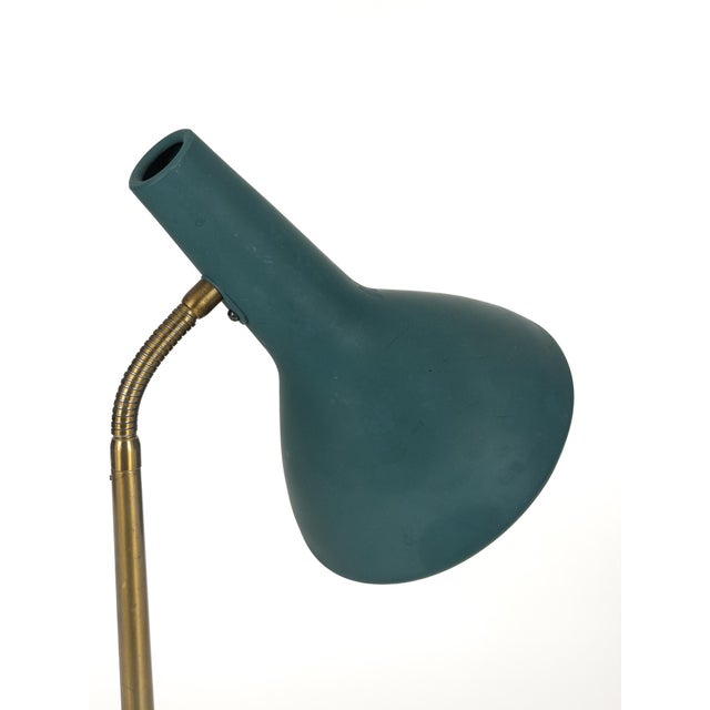 Harald Notini’s model 15708 for Arvid Böhlmarks Lampfabrik embodies the refined balance between Scandinavian restraint and...