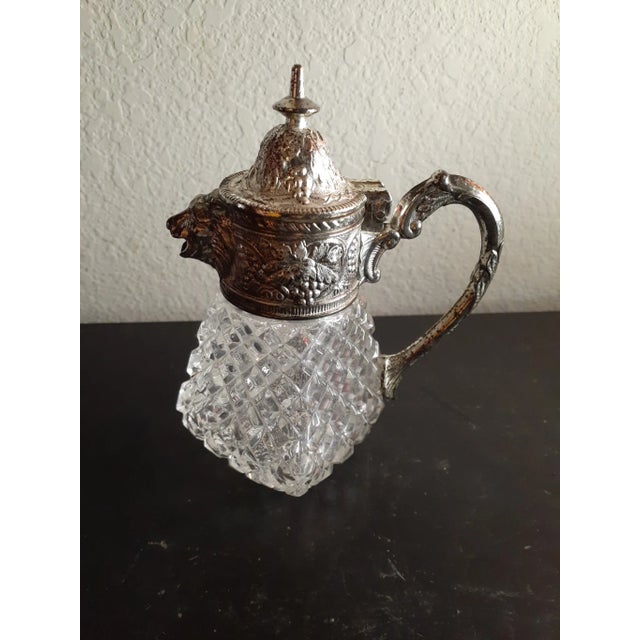 This is an EXQUISITE Hazel Atlas Clear Crystal 5" Syrup Pitcher with Lion Head Handle. Procured at auction KITCHEN