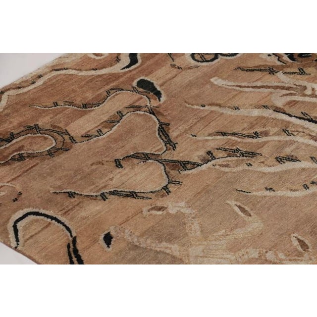 Hand-knotted in wool and silk, this 7x9 rug from the Modern Classics Collection by Rug & Kilim is a contemporary homage to...