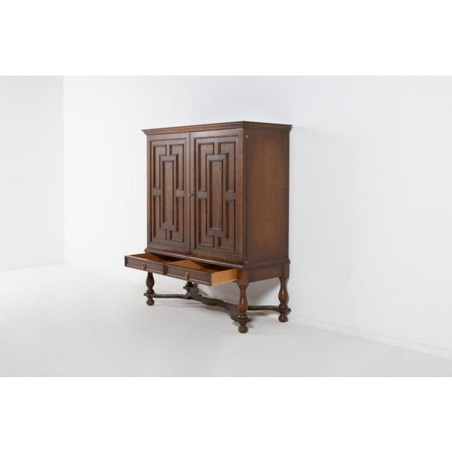 Scandinavian Modern cabinet by Swedish icon Axel Einar Hjorth for Nordiska Kompaniet, produced in 1930s. The piece is made...