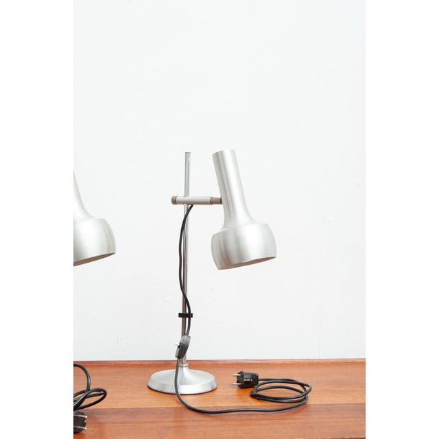A pair of table lamps in excellent condition; the shades are height-adjustable. Manufactured by: Leclaire & Schäfer,...