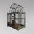 Impressive large birdcage, decorative with two wooden doors and a turned gallery; the woodwork is adorned with painted...