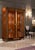 Handcrafted in Spain, this china cabinet features oak burl veneer with sycamore inlays, ebony accents, and bronze trim...