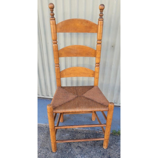 19thc Ladder back natural colored chair. Wonderful patina and age. The rattan seat is in great condition. Chair is strong...