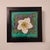 Crocheted white and lavender flower with green depicting stem and leaves. The Columbine, the state flower of Colorado....