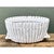This vintage white ceramic bamboo basket is a charming example of faux bois decorative arts, its oval form entirely molded...
