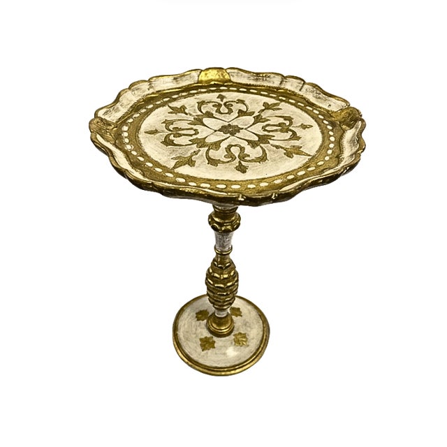An elegant vintage Italian Florentine pedestal side table with a beautifully scalloped tabletop, ornate floral detailing,...