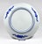 An antique Japanese decorative porcelain charger with rich blue-and-white decoration, believed to date to the early 20th...
