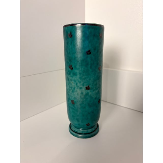 Wilhelm Kåge for Gustavsberg vase from the Argenta series. This is a 7" stoneware vase with a mottled green glaze and...