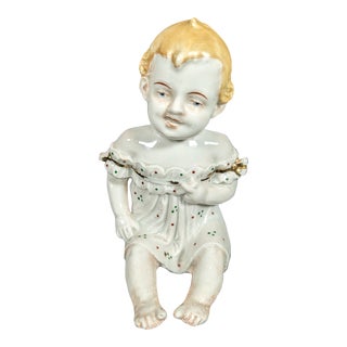 Antique Victorian Bisque Porcelain Piano Sitting Baby, German Backstamp For Sale