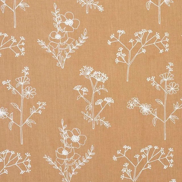 Rendered in simple chain stitching, this wonderfully naive botanical pattern has the delicate quality of a hand-drawn...