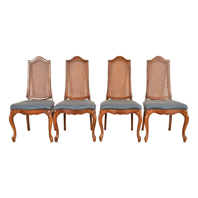 Baker Furniture Style French Provincial Louis XV Carved Walnut and Cane Back Dining Chairs, Set of Four For Sale