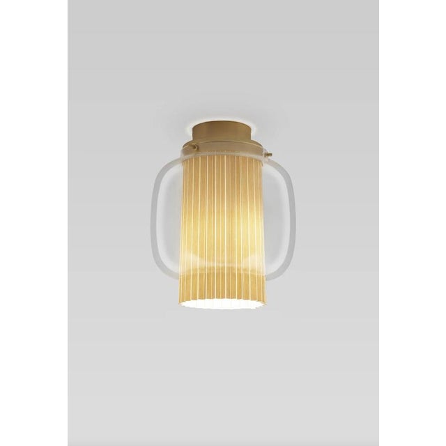 Sebastian herkner manila c pe golden matte-beige celling lamp for parachilna an incredibly elegant combination of...