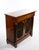 An elegant English rosewood server cabinet dating to circa 1880, reflecting the refined neoclassical influences and...