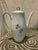 Elegant vintage porcelain coffee pot by Bareuther Waldsassen, crafted in Bavaria, Germany. This graceful mid-century piece...