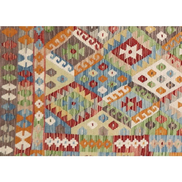 Contemporary Afghan Maimana Kilim Rug. Hand woven with wool on wool foundation by the Maimana tribes of Northern...