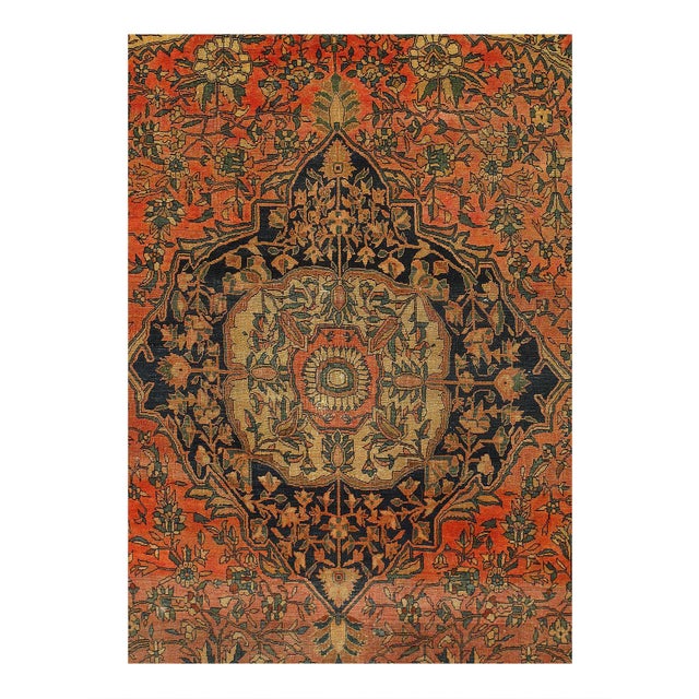 The first thing that stands out about the artistry of this small antique Persian Farahan carpet is its use of concentric...