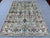 This hand-knotted Sultanabad rug is woven from hand-spun Ghazni wool on a cotton foundation, featuring an all-over...