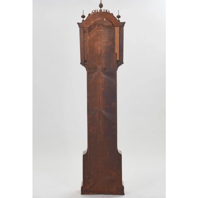 This listing is for an early American grandfather clock. This clock dates to the early 1800s and was made by Riley Whiting...