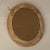 Vintage Oval Convex Mirror With Black and Gold Ornate Wooden Frame. For Sale - Image 10 of 12