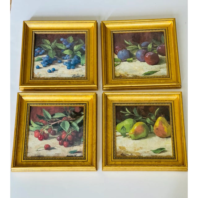 Beautiful set of 4 oil on board still life paintings of fruit and berries.12” square, framed in gold frames. Great...