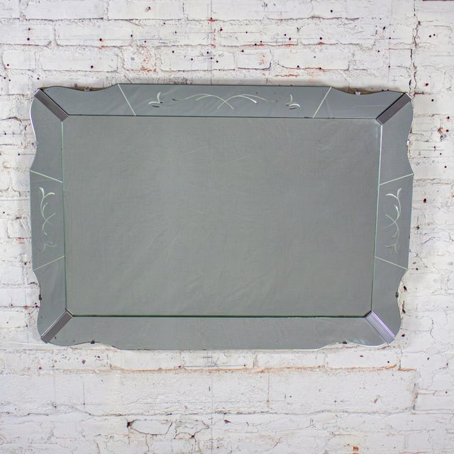 Marvelous vintage Art Deco & Hollywood Regency large wall mirror composed of a rectangular shape etched Venetian glass...