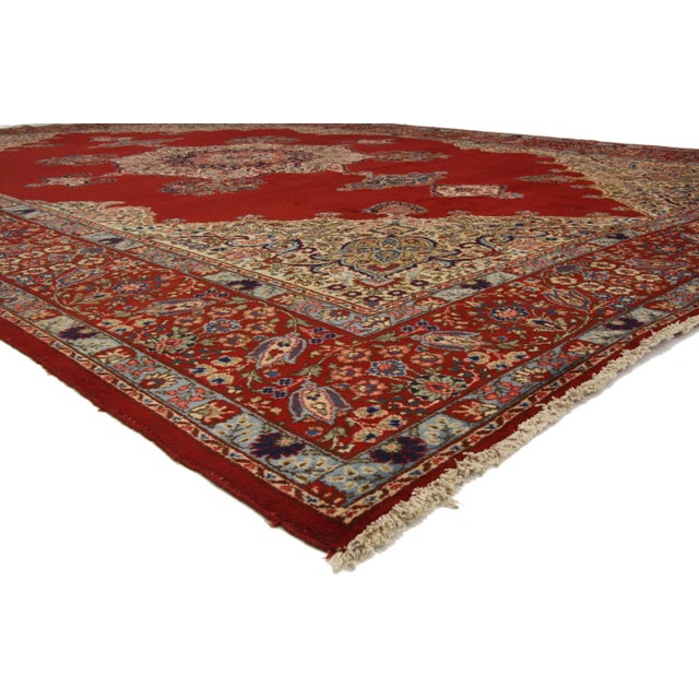 72013 Antique Persian Tabriz Rug, 11'09 x 17'06. Bathed in rich ruby red, this hand-knotted wool antique Persian Tabriz...