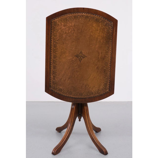 Good quality figured mahogany tripod table from Reprodux Bevan Funnell 1970s The tilt top with underside carved and turned...