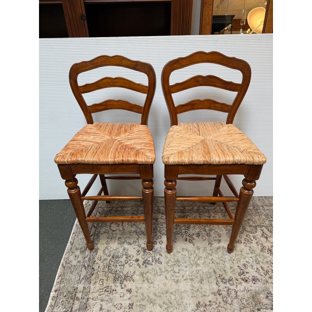 Design Plus Gallery presents a Pair of Avignon Bar Stools from Ballard Designs. The stools are made of solid birch wood...