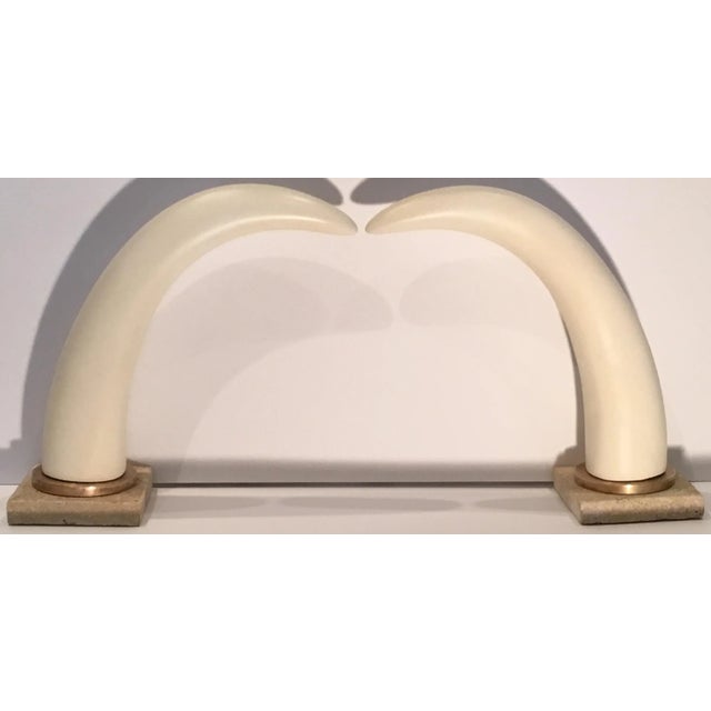 Elagent pair of tusks, made of heavy resin and painted in cream color,that give us the look of ivory, professionally...