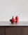 A pair of belgian mid-century ceramic vases attributed to rogier vandeweghe for amphora. Both are finished in the intense...