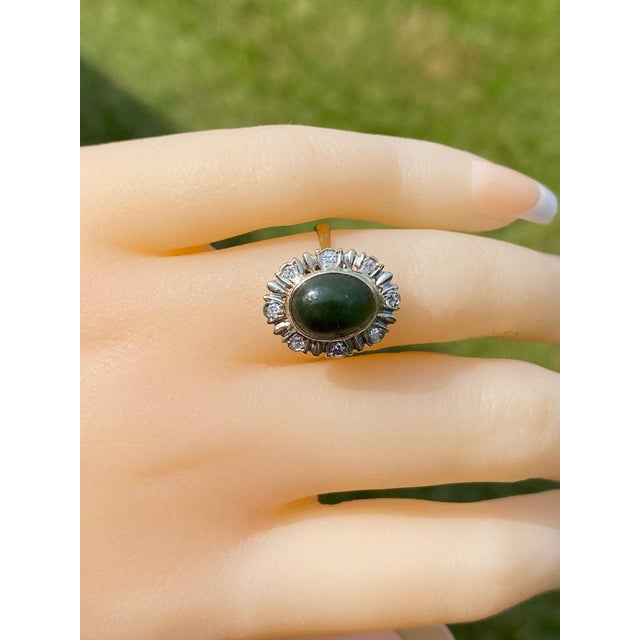 The Mescal Range: Mid Century Modern Nephrite and Diamond Cocktail Ring. The ring centers on a New Zealand oval Nephrite...