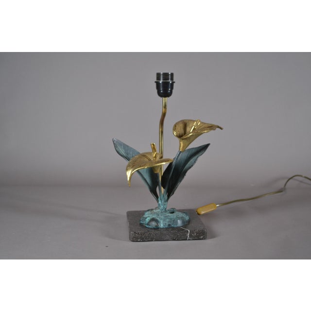 Vintage Brass Flower Lamp, in Good conditions. Designed 1960 to 1969 European Plug (up to 250V).The wiring of this item...