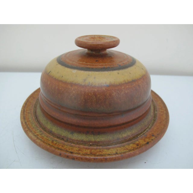 Wally Schwab studio pottery round serving dish with lid. Schwab is a ceramic artist from Oregon known for creating...