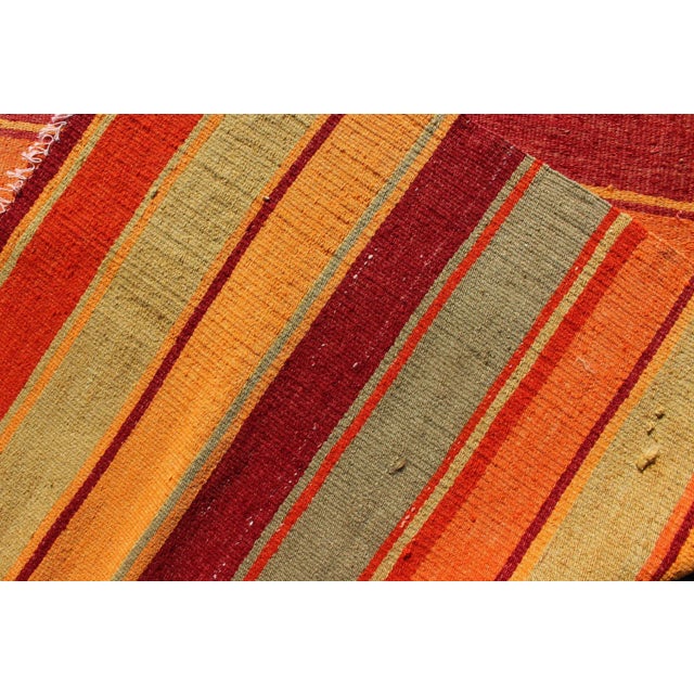 Green Vintage Turkish Kilim Rug in Red, Orange, Gold, and Sage Green Striped Pattern For Sale - Image 8 of 9