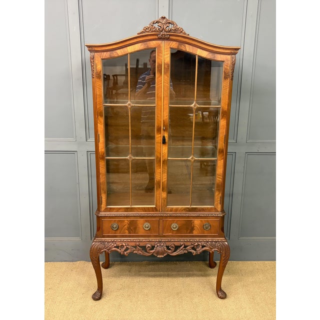 A very good queen anne style flame mahogany display cabinet by maple & co. Of london. Dating from the early 20th century...
