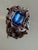 Metal 1970s Hollywood Regency Brooch With Tanzanite Rhinestones For Sale - Image 7 of 8